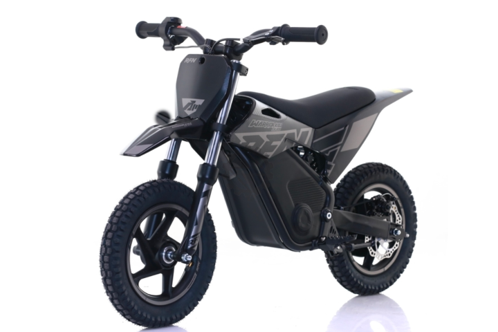 Black electric dirt bike with thick tires on a white background.