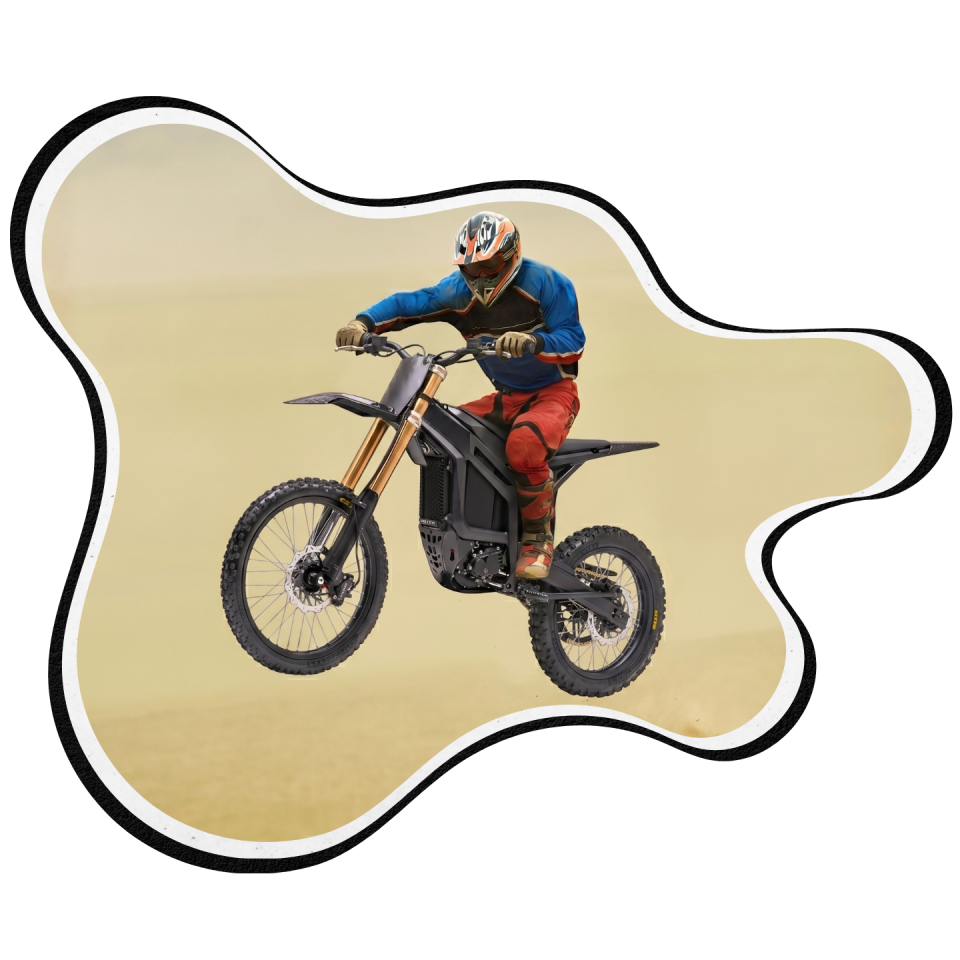 Dirt biker in mid-air on an electric motorcycle.